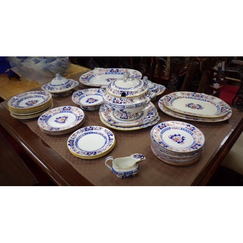 82 - Thirty eight piece assorted Ironstone dinner service with ornate foliate decoration