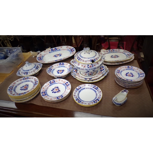 82 - Thirty eight piece assorted Ironstone dinner service with ornate foliate decoration