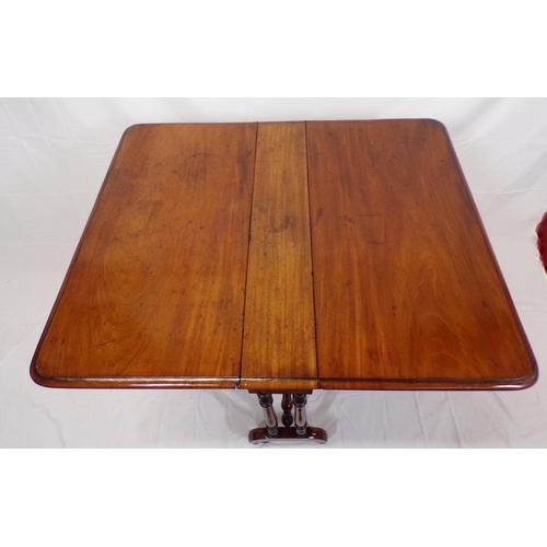 94 - Victorian mahogany Sutherland table with drop leaves, rounded borders, gateleg support, turned colum... 