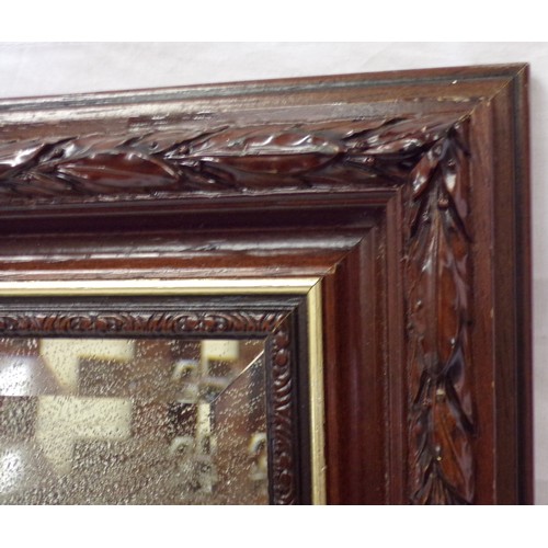 192 - Edwardian bevelled glass wall mirror with foliate frame