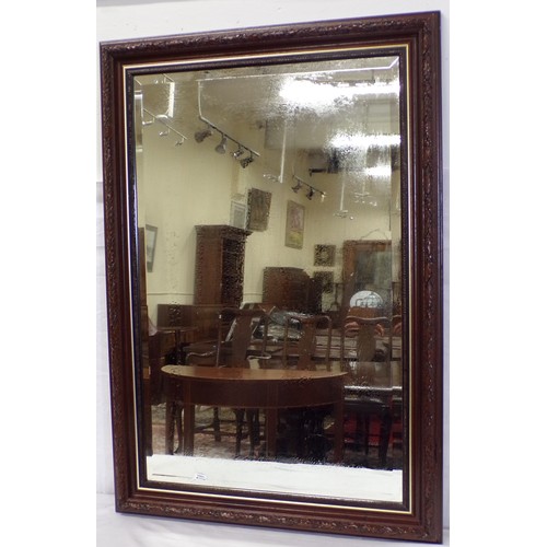 192 - Edwardian bevelled glass wall mirror with foliate frame