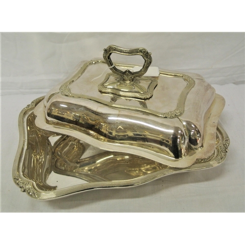 7 - Silver plated entree dish with reeded and foliate decoration, detachable handle and cover, retailed ... 