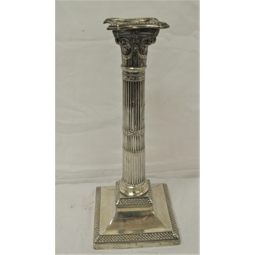 10 - Regency style candlestick with shaped sconce, corinthian column on stepped base