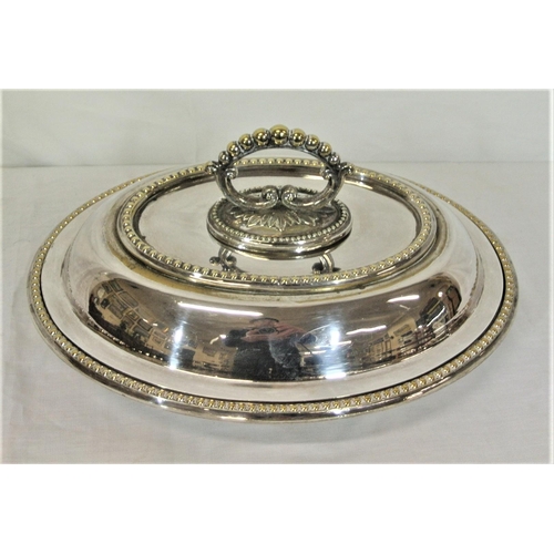 11 - Oval silverplated entree dish with detachable lid and handle and beaded decoration