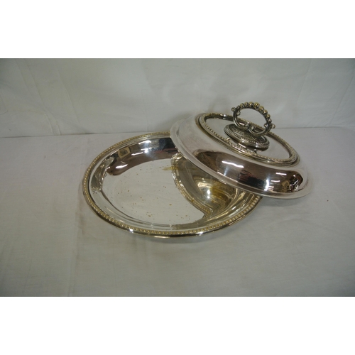 11 - Oval silverplated entree dish with detachable lid and handle and beaded decoration