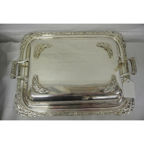 17 - Pair of silver plated entree dishes with shaped handles and Celtic decoration