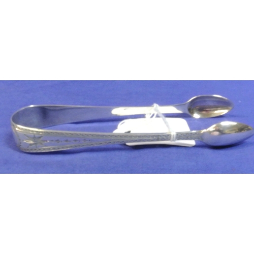 132 - Irish silver bright cut sugar tongs by Thomas Farnett c 1826.    13.5cm