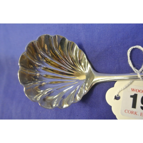 195 - Irish silver sauce ladle with shell bowl and foliate decoration, by D Peter, Dublin 1764.  15cm, 47g