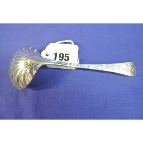 195 - Irish silver sauce ladle with shell bowl and foliate decoration, by D Peter, Dublin 1764.  15cm, 47g