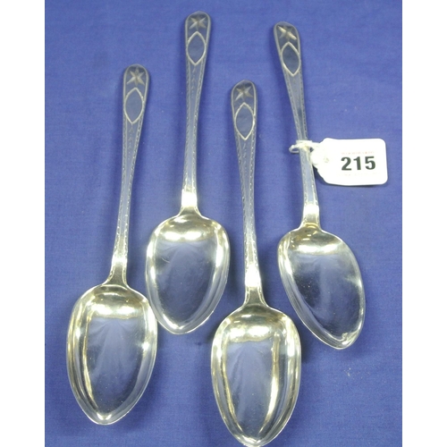 215 - Set of four Irish silver bright cut serving spoons by Thomas Meade, Dublin 1834. 23cm, 248g