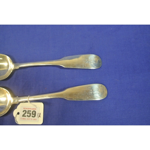 259 - Pair of Irish silver serving spoons with crested handles, by William Ward, Limerick 1802. 23cm, 129g