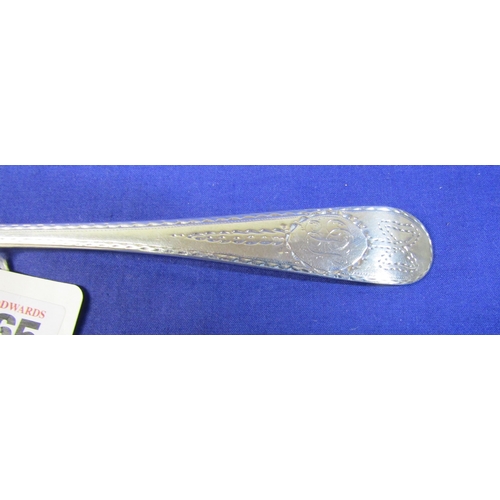 265 - Irish silver bright cut serving spoon by John Nicholson, Cork c.1800, 23cm, 62g