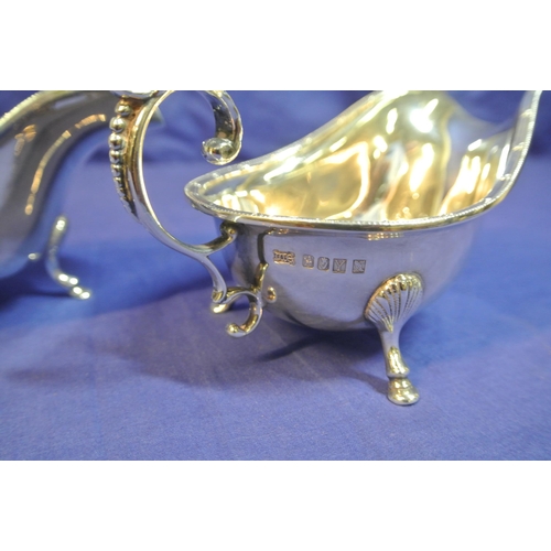 268 - Pair of Cork silver boat shaped sauceboats by William Egan & Sons, with Celtic rims, shaped handles,... 