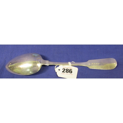 286 - Irish silver serving spoon with crested fiddle pattern handle, by Richard Garde, Cork 1805, 23cm, 81... 