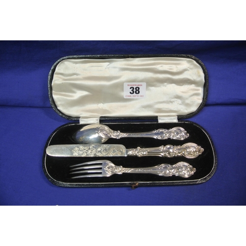 38 - Sheffield silver three piece christening set with ornate etched decoration, dated 1870