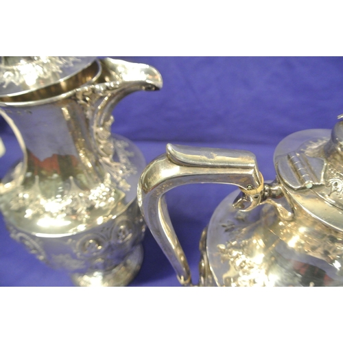 87 - 5 Piece Victorian Birmingham silver tea service, with shaped finials, profusely embossed with shamro... 