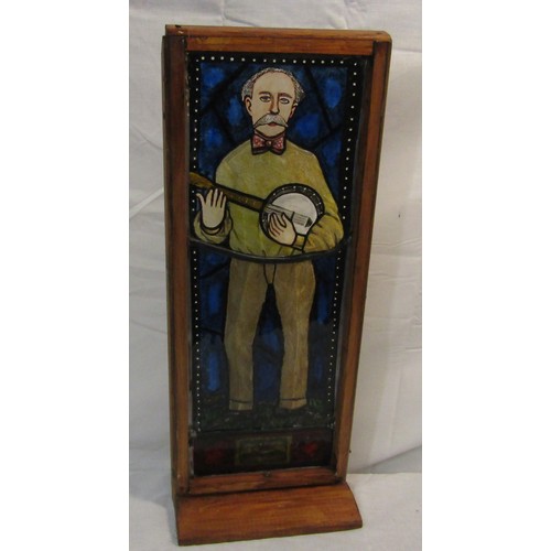 427 - James Cox 'Percy French' stained glass panel in timber frame, 44x16cm, signed lower right