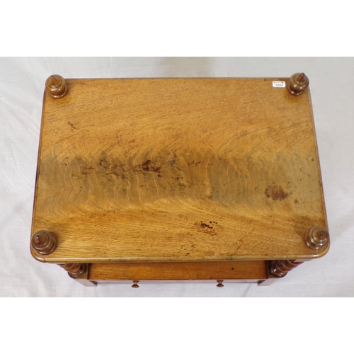 29 - Victorian walnut two tier occasional table with barleytwist columns, frieze drawer, brass castors