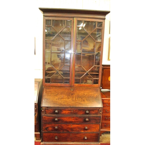 30 - Georgian mahogany bureau bookcase with dentil frieze, astragal glazed doors, reeded adjustable shelv... 