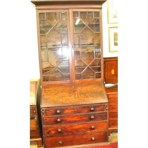 30 - Georgian mahogany bureau bookcase with dentil frieze, astragal glazed doors, reeded adjustable shelv... 