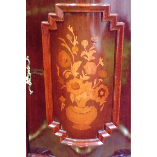 125 - French style serpentine fronted display cabinet with scroll decorated pediments, foliate inlay, shap... 