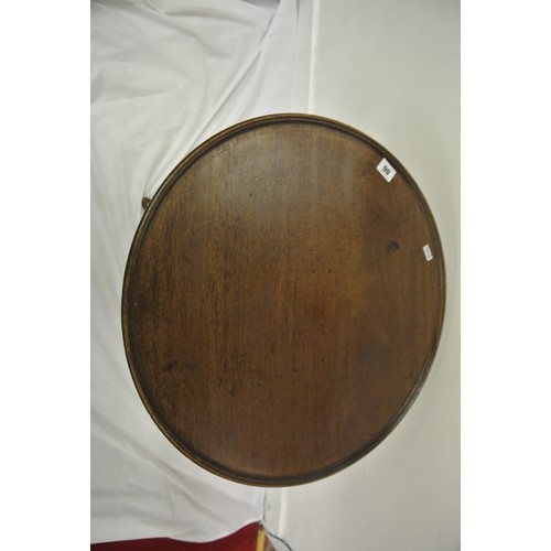 126 - Victorian mahogany round occasional table with tip-up top, baluster turned column, on hipped tripod