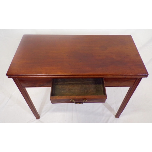 130 - Georgian style mahogany tea table with fold-over top,  pull-out gateleg support, frieze drawer with ... 