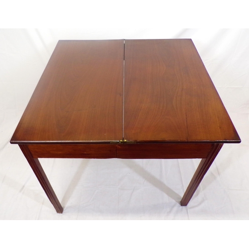 130 - Georgian style mahogany tea table with fold-over top,  pull-out gateleg support, frieze drawer with ... 