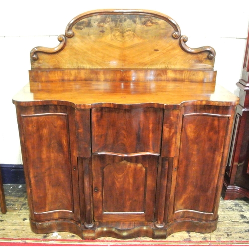 135 - Victorian mahogany chiffonier with shaped scroll decorated back, centre drawer and press, two side p... 