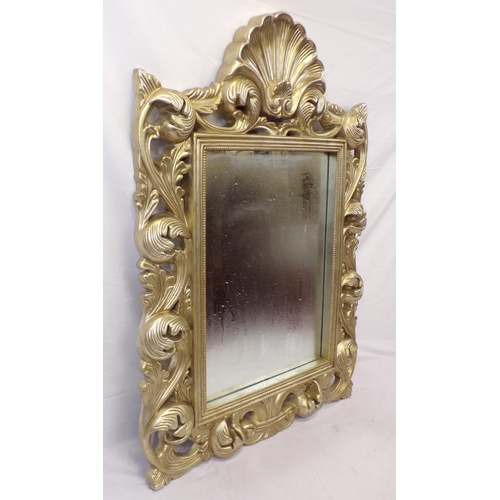 141 - Ornate gilt framed wall mirror with shell and foliate decoration