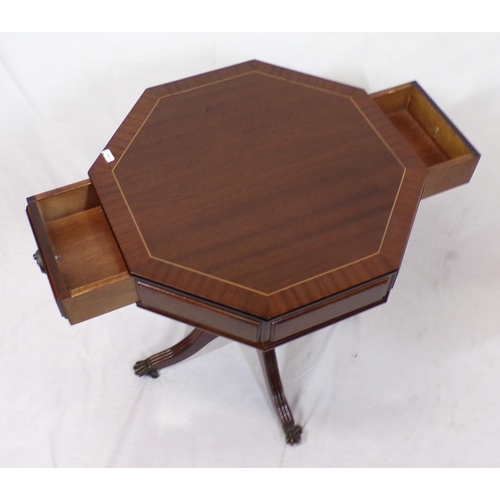 144 - Octagonal shaped mahogany centre table with frieze drawers, brass turned column, on reeded quadrapod... 