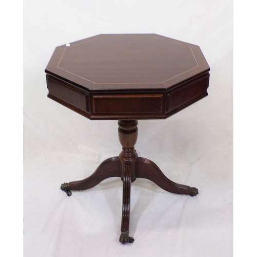 144 - Octagonal shaped mahogany centre table with frieze drawers, brass turned column, on reeded quadrapod... 