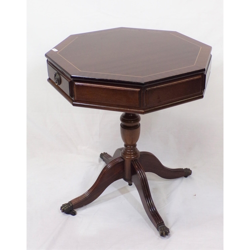 144 - Octagonal shaped mahogany centre table with frieze drawers, brass turned column, on reeded quadrapod... 