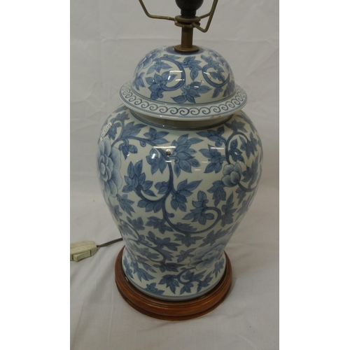 124 - Oriental style baluster shaped converted lamp with foliate decoration and timber base