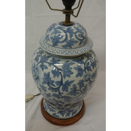 124 - Oriental style baluster shaped converted lamp with foliate decoration and timber base