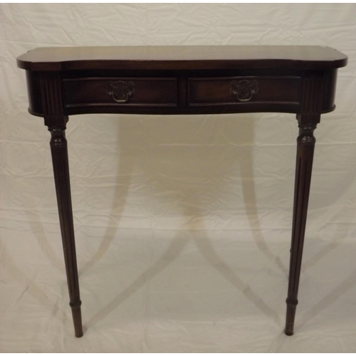 129 - Edwardian mahogany hall or side table with serpentine front, two frieze drawers with brass drop hand... 