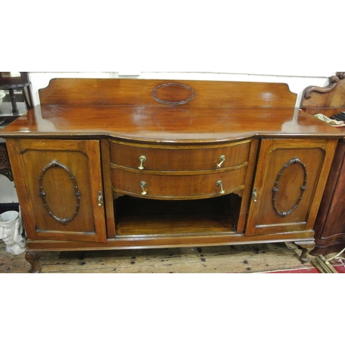 145 - Edwardian mahogany bow fronted sideboard with tray back, two central drawers, shelved side presses w... 