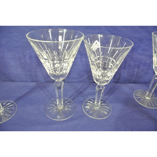 163 - Six Waterford Crystal stemmed wine glasses with faceted decoration and round bases