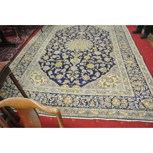 174 - Rich blue ground Persian Kashan carpet traditional floral design. 390x285