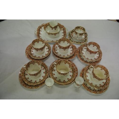 22 - Twenty-four piece Stanley English porcelain tea service with foliate and gilt decoration