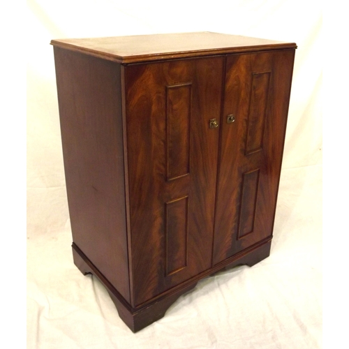 24 - Edwardian style mahogany television cabinet with panelled doors and shelved interior