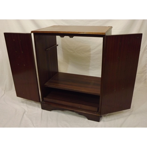24 - Edwardian style mahogany television cabinet with panelled doors and shelved interior