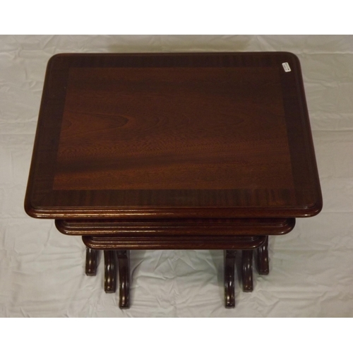 26 - Edwardian style inlaid and crossbanded mahogany nest of three tables, urned columns and bracket feet