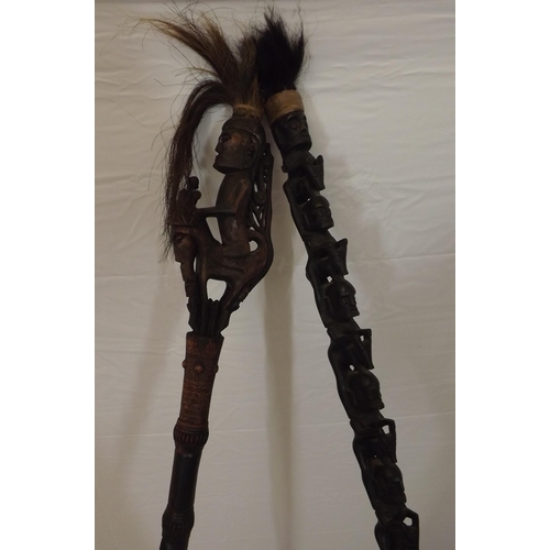33 - Two African tribal carved ceremonial spears