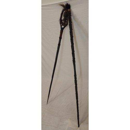 33 - Two African tribal carved ceremonial spears