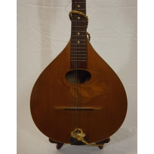 43 - Romanian inlaid yew mandolin with foliate inlay