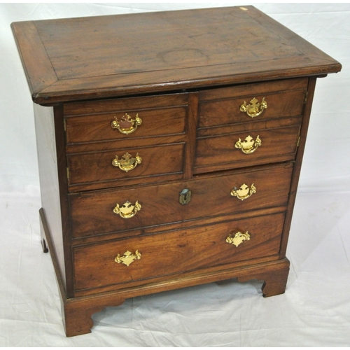 46 - Edwardian mahogany commode with lift-up lid, chest of drawer front with drop handles, on bracket fee... 