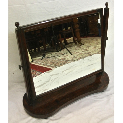 47 - Edwardian mahogany swivel mirror with reeded tapering columns, on kidney shaped base.