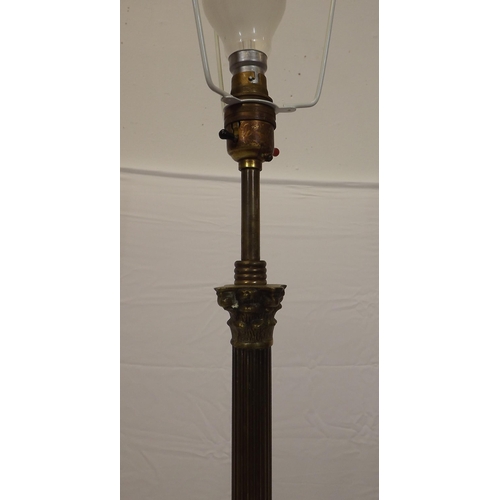 48 - Reeded brass standard electric lamp with raised base