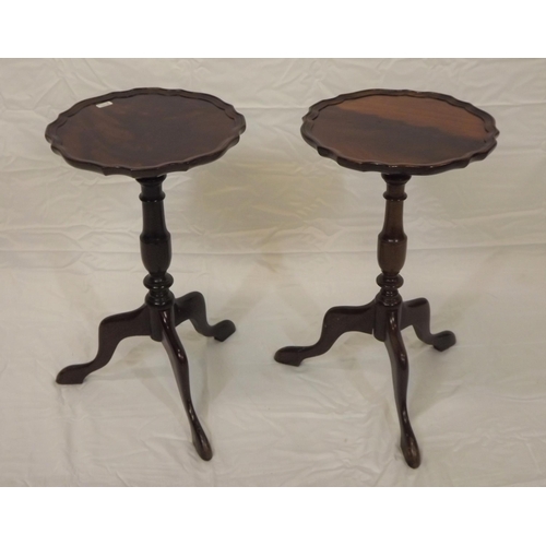57 - Pair of Edwardian mahogany lamp tables with piecrust borders, vase turned columns, on hipped tripods